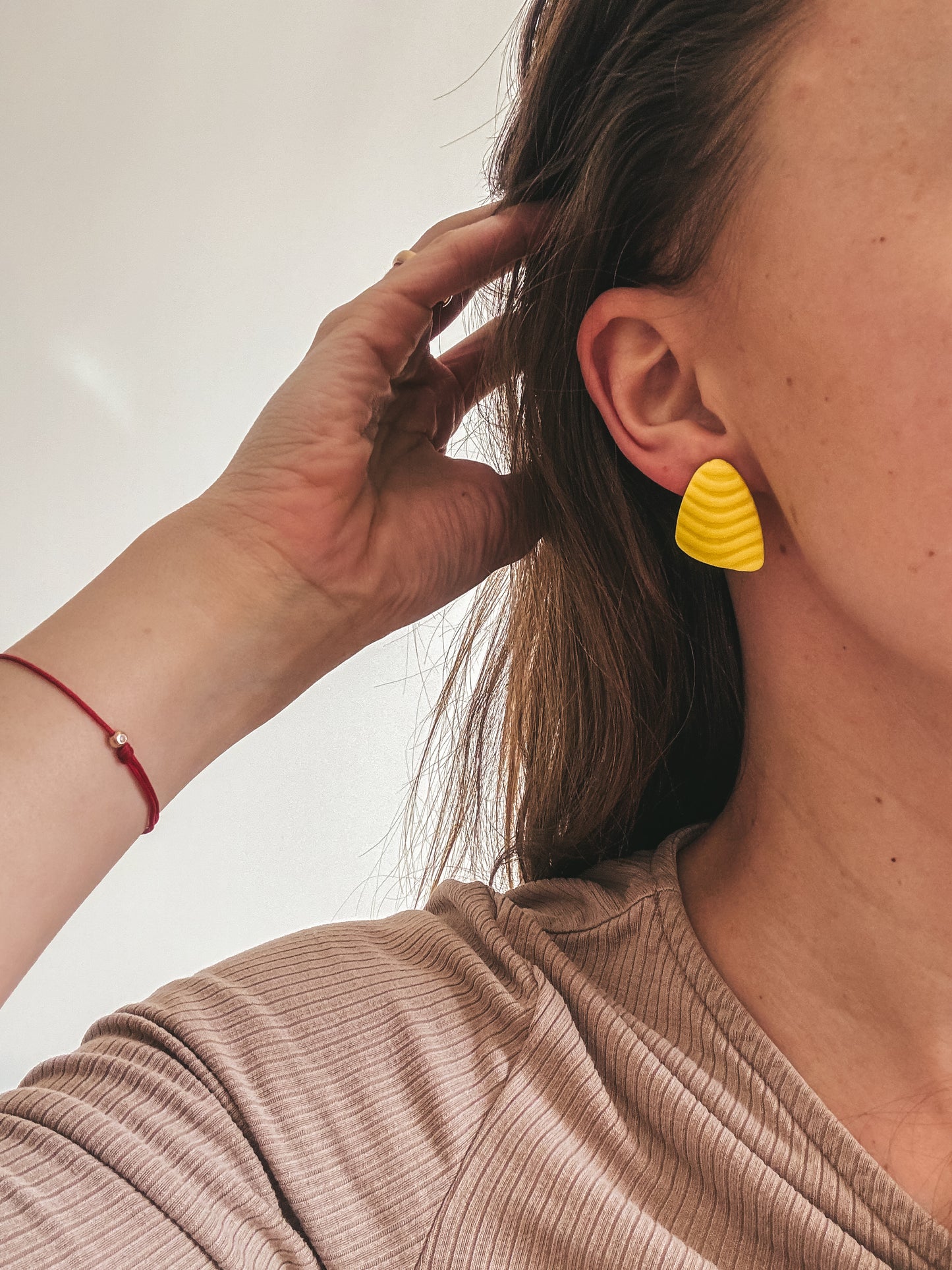 Prie ausies prigludę auskarai